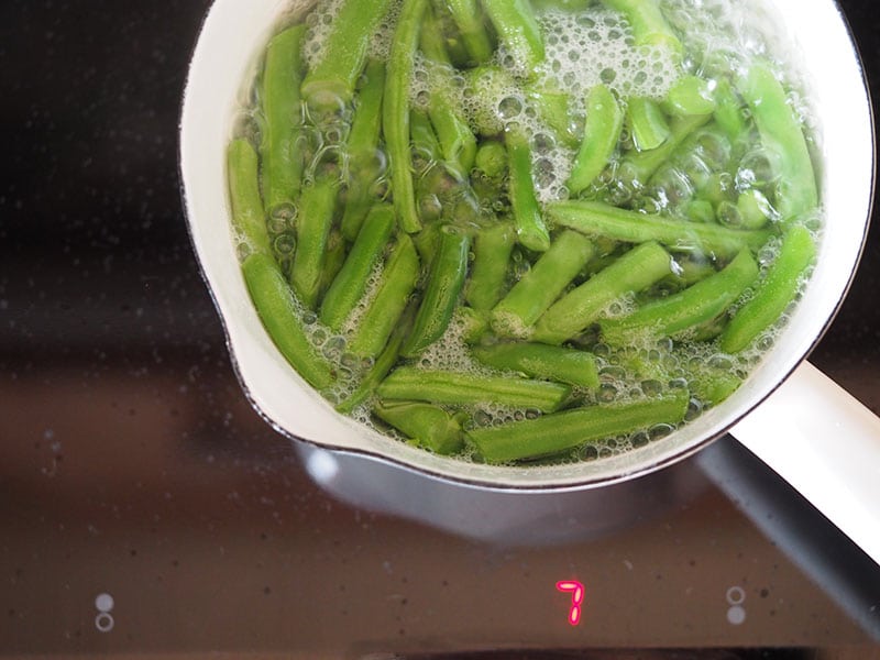 Cook them in an non-aluminium saucepan