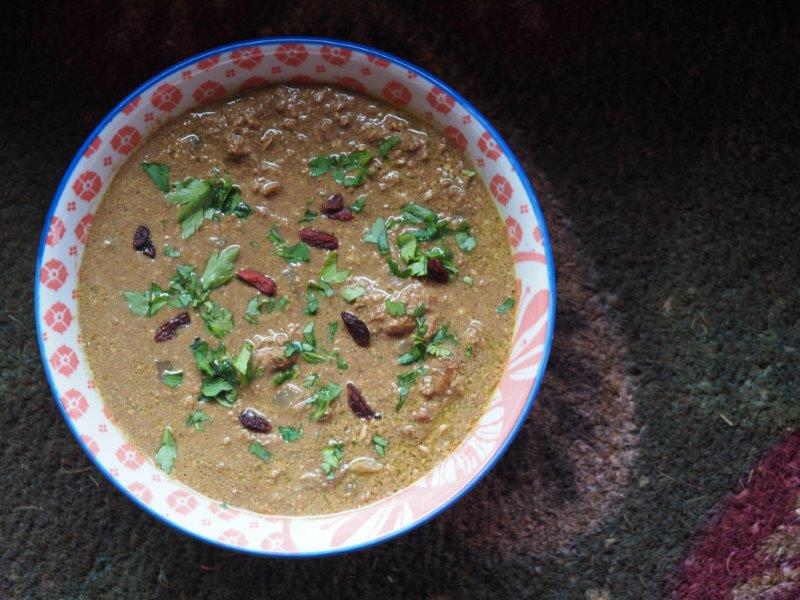 Fesenjan is darker because of the pomegranate molasses