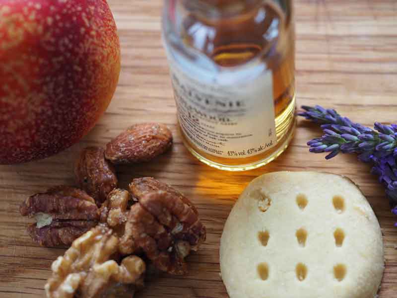 grilled nectarines filled with a nut and shortbread biscuit mix