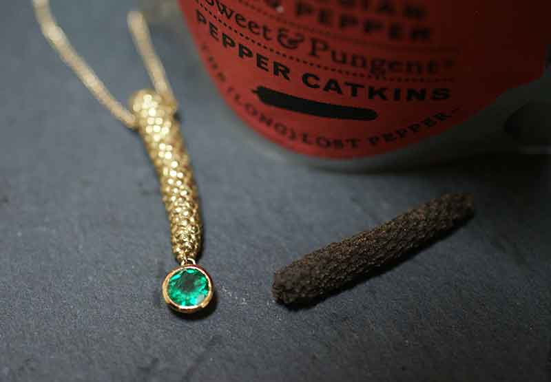 A fabulous solid gold pendent moulded from an Indonesian long pepper by Astratelli.