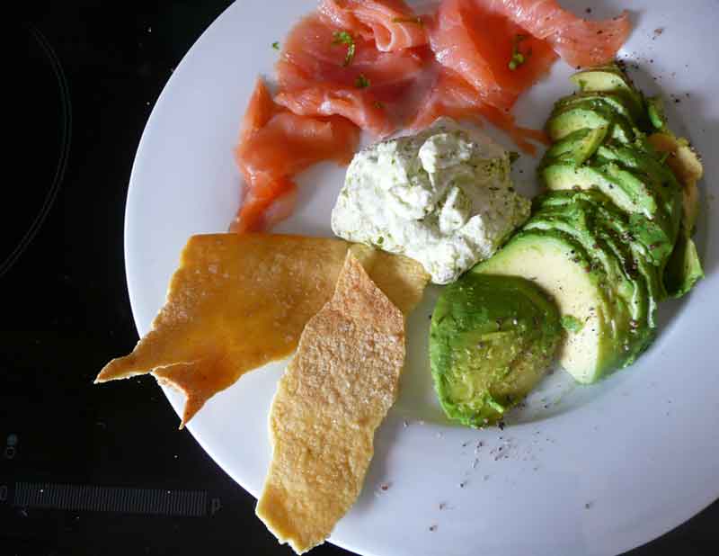 Mix the ricotta with a bit less pesto and serve with avocado, smoked salmon and warm pane carasau