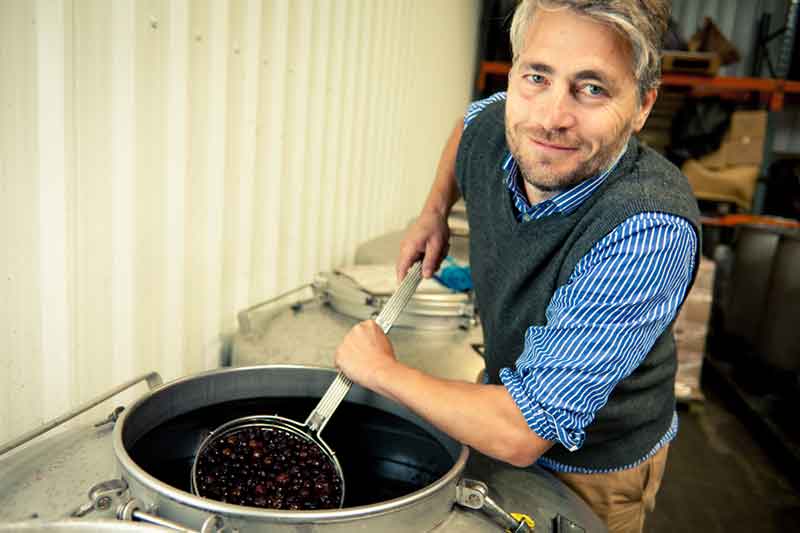 Joff Curtoys stirring the gin